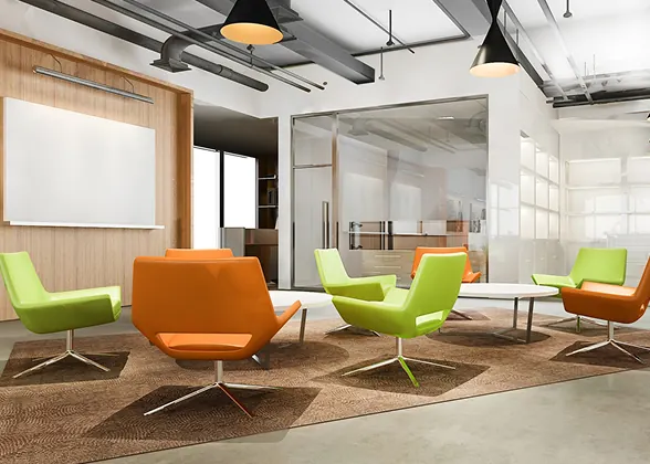 Lounge area with green and orange chairs